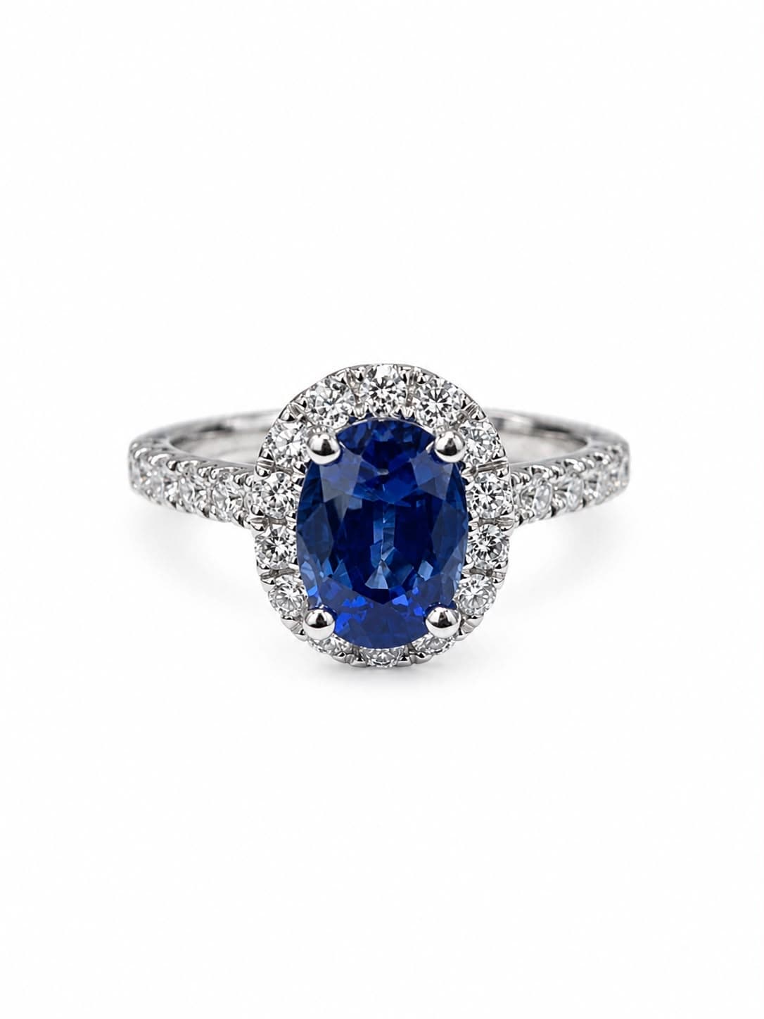 1.16 CT Oval Sapphire and Diamond Halo Ring