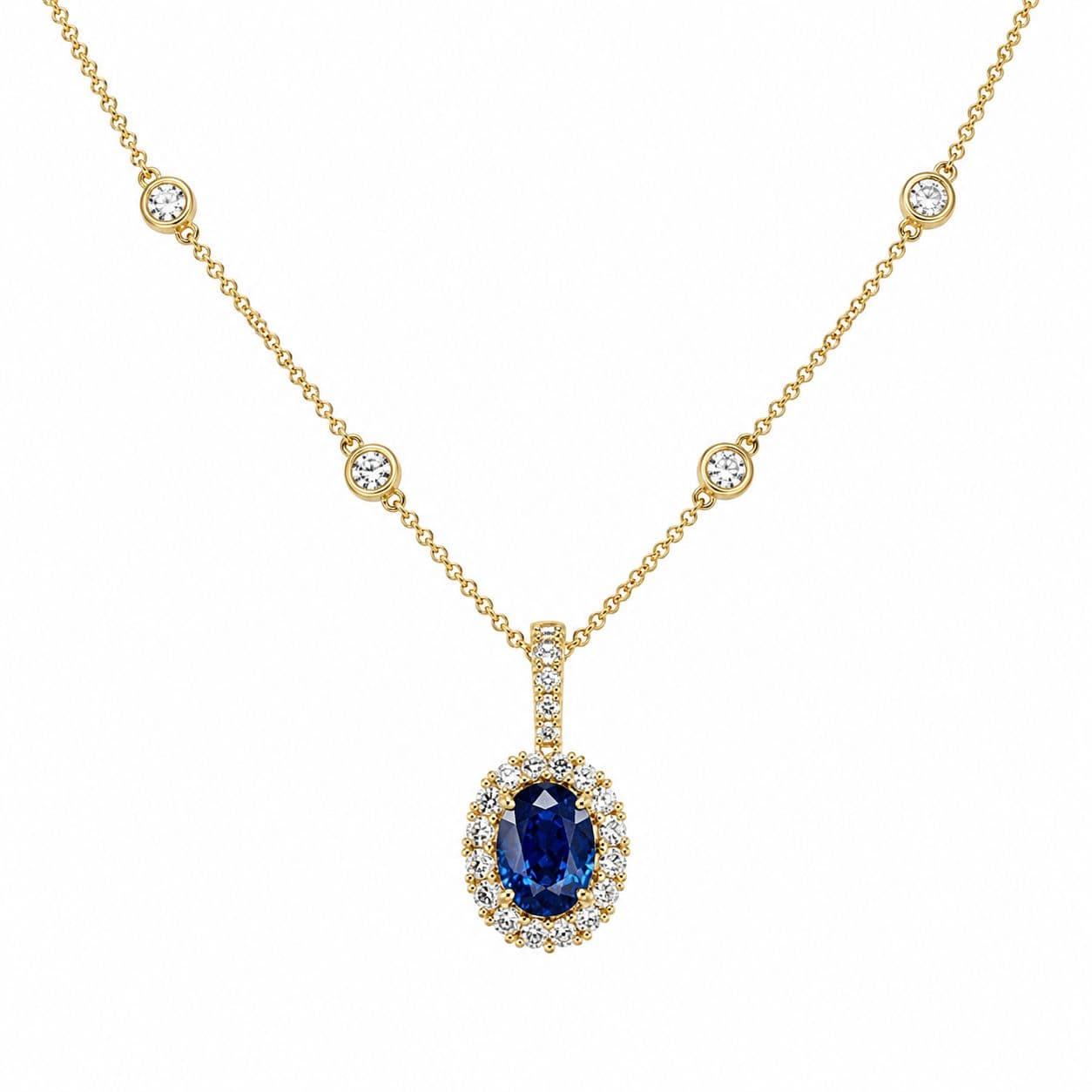 Shown in 18K Yellow Gold with Blue Sapphire