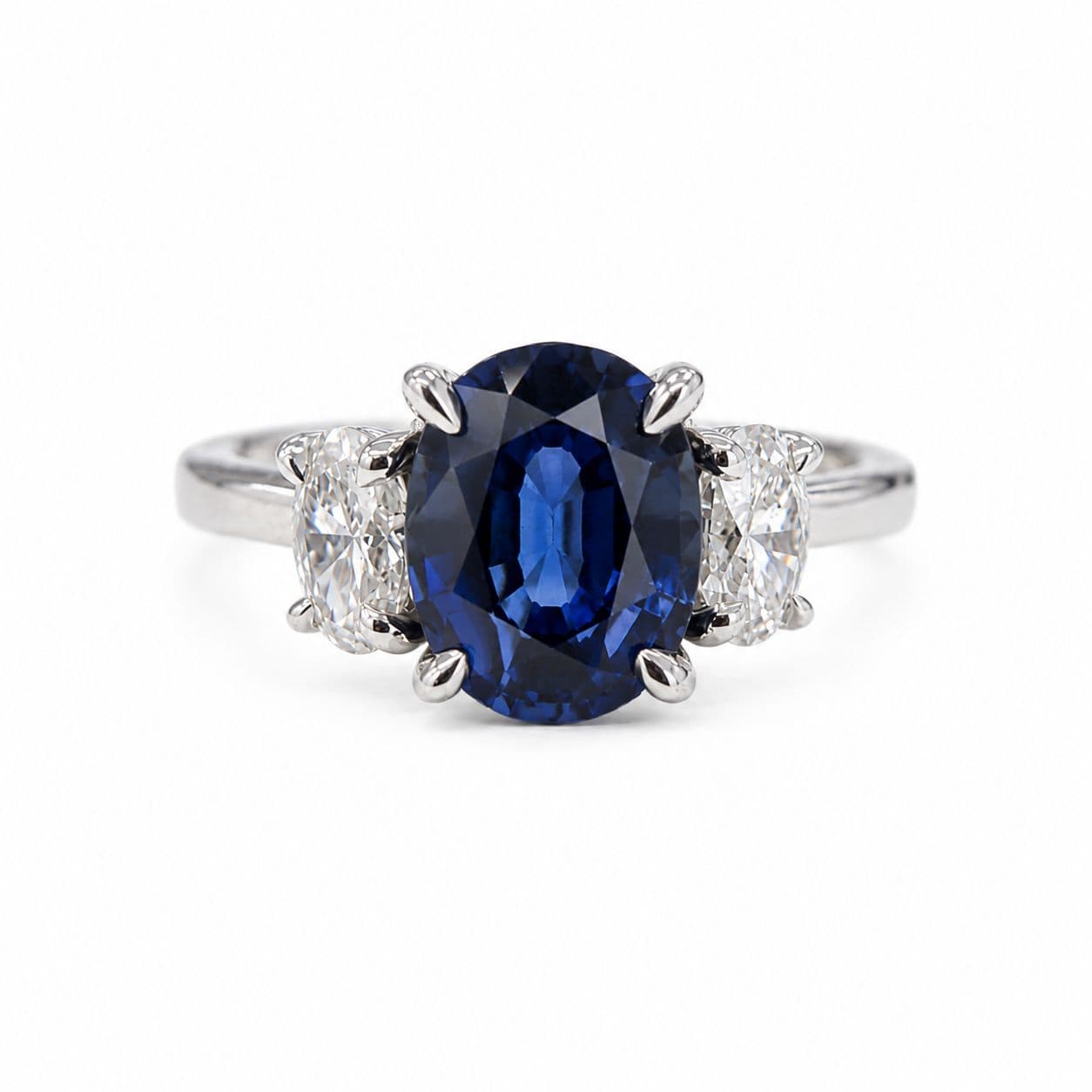1.6 CT Oval Sapphire and Diamond 3 Stone Ring
