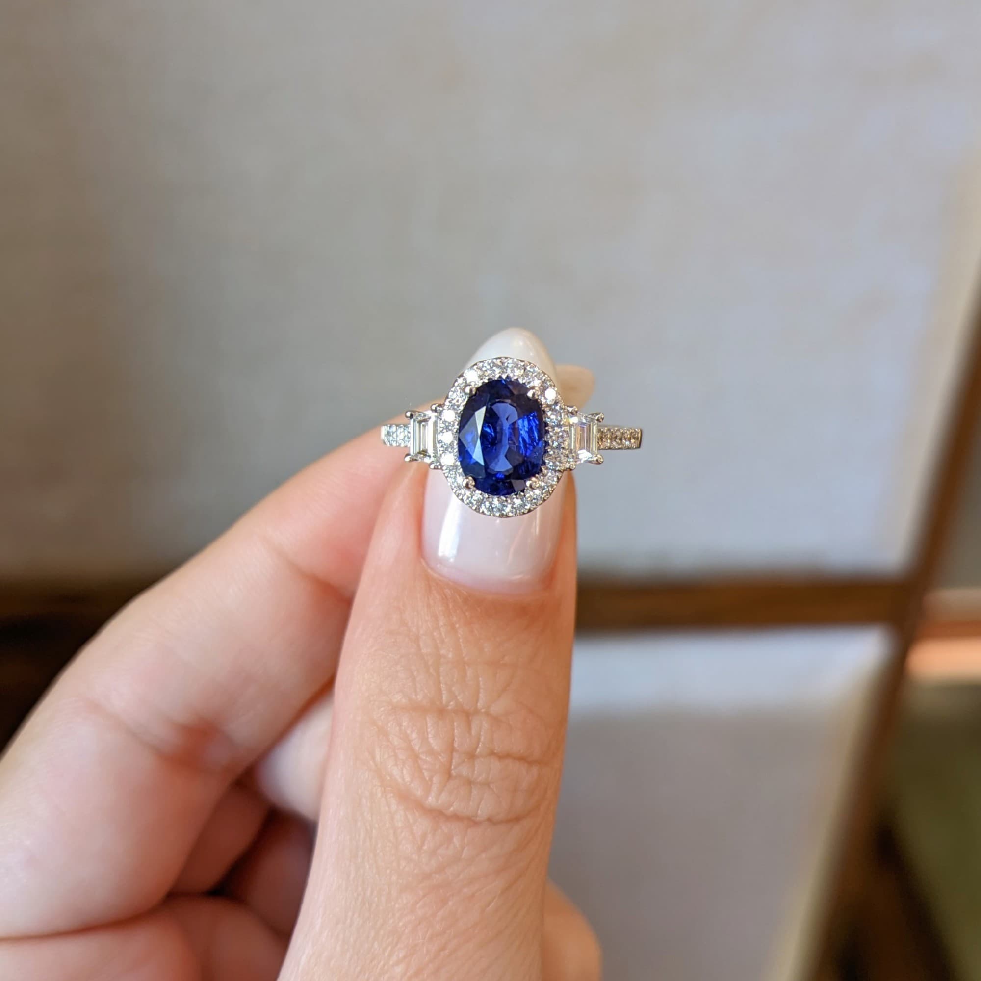1.57 CT Oval Sapphire and Diamond 3 Stone Halo Ring