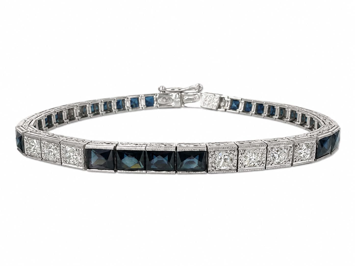 Shown in Platinum with Blue Sapphire