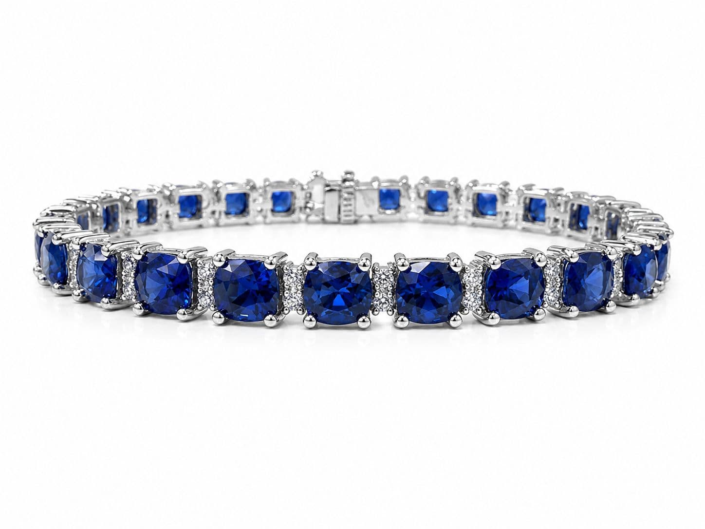 Shown in 14K White Gold with Blue Sapphire