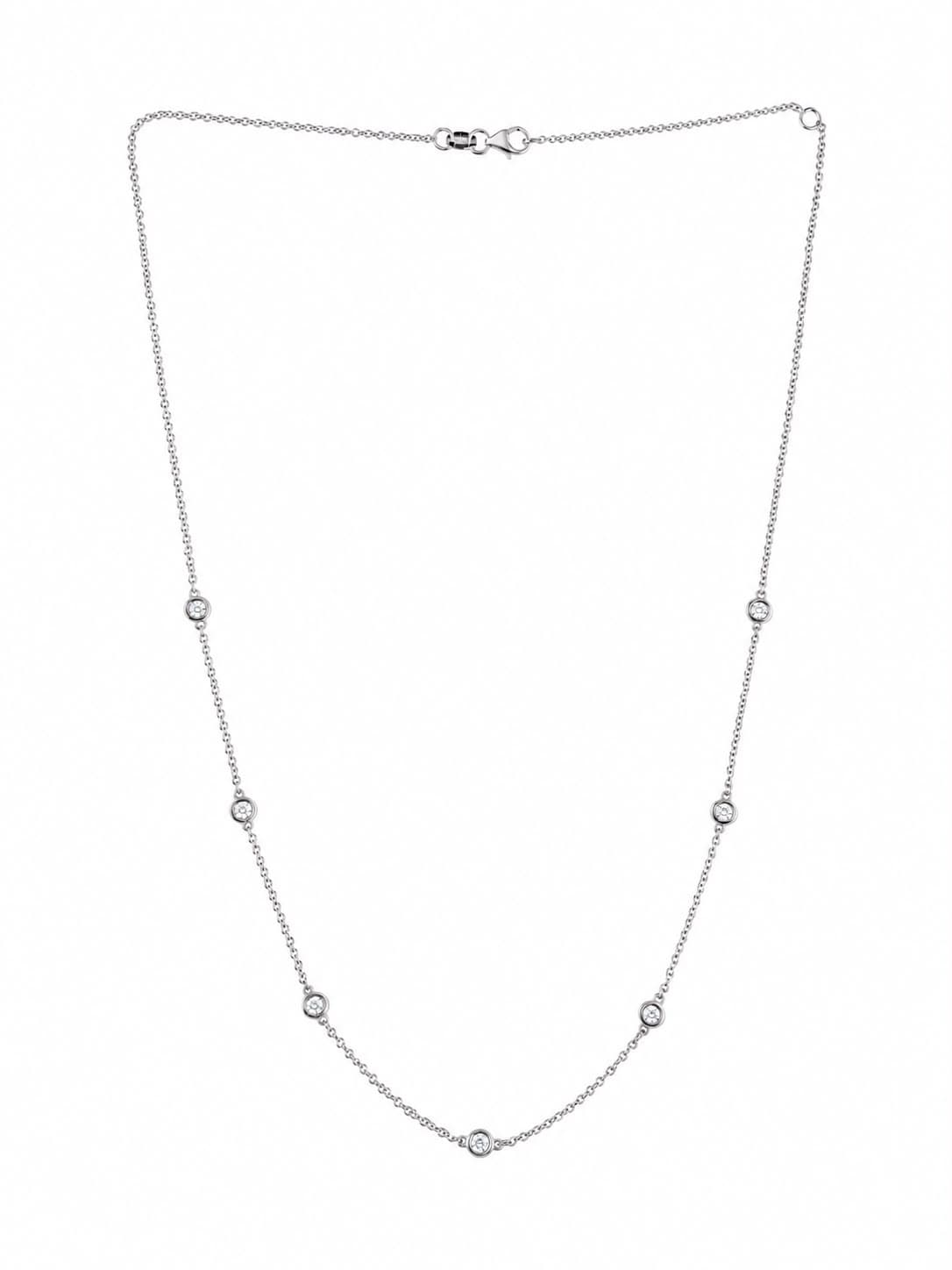 Shown in 14K White Gold with White Diamond