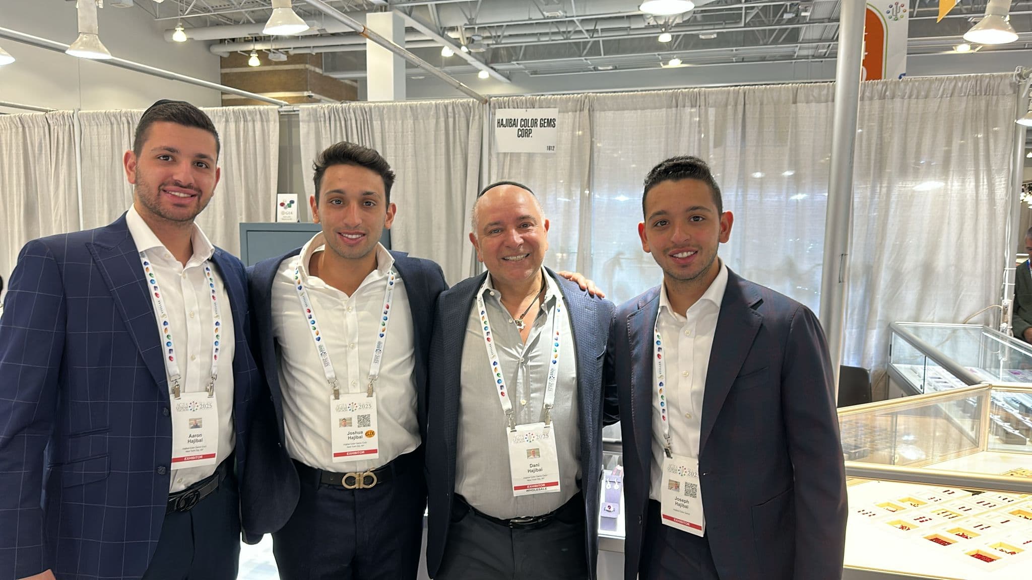 The Hajibai Jewelry team at a trade show